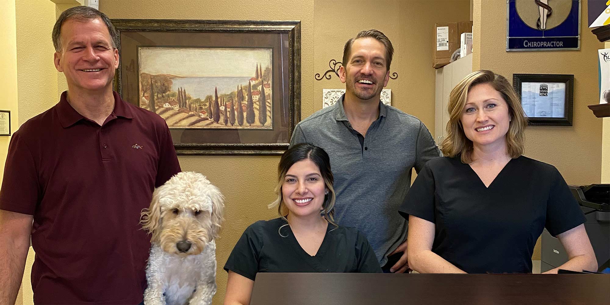 Chiropractor Reno NV David Berg and His Team with Dog Chiropractor Reno NV David Berg and His Team with Dog